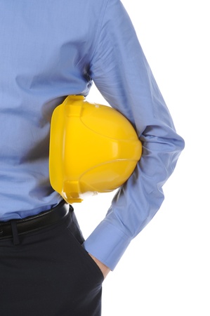 Businessman with construction yellow helmet. Isolated on white backgroundの写真素材
