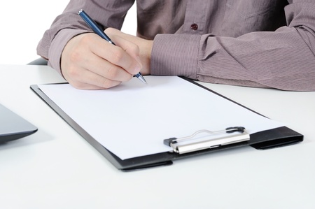 Businessman holding a pen. Isolated on white backgroundの写真素材