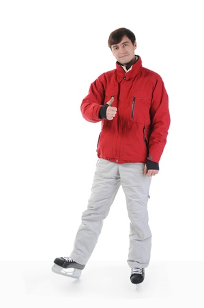 Smiling man in winter style with skates. Isolated on white backgroundの写真素材