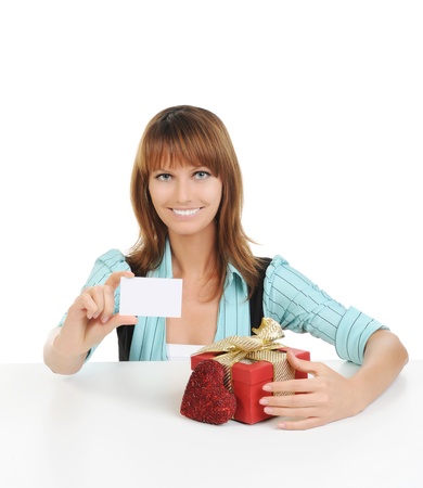 young woman with a gift box. Isolated on white backgroundの写真素材