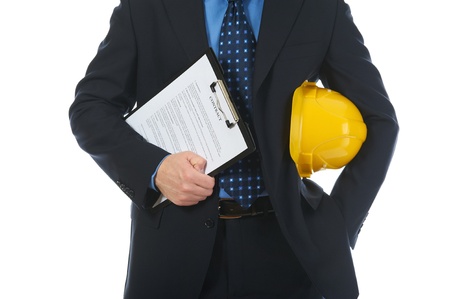 Businessman with construction helmet Businessman with construction helmet