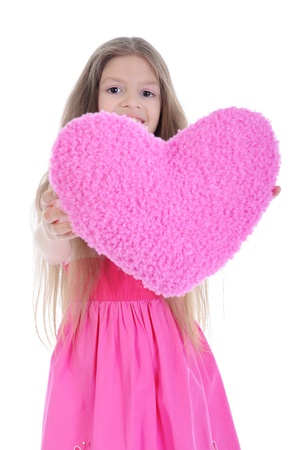 Little girl holding heartの写真素材
