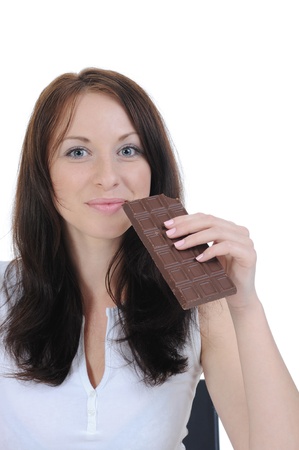 girl eating chocolate.の写真素材