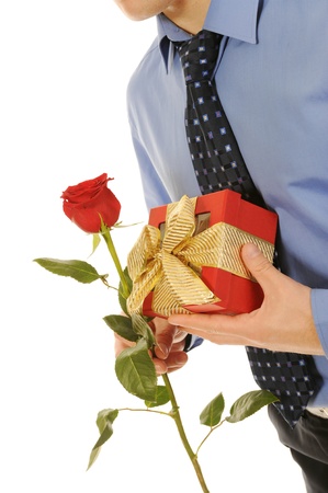 man with a gift box and a roseの写真素材