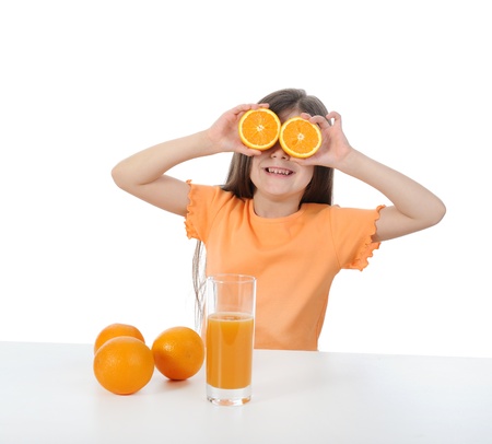 Girl with orangeの写真素材