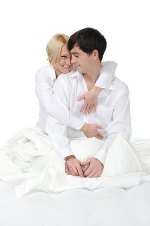 Happy family lying in bedの写真素材