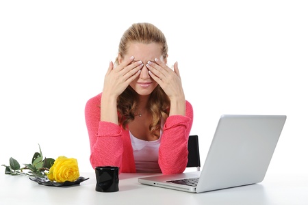 Weeping woman at a computerの写真素材