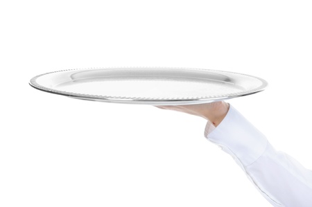 Waiter holding empty silver trayの写真素材
