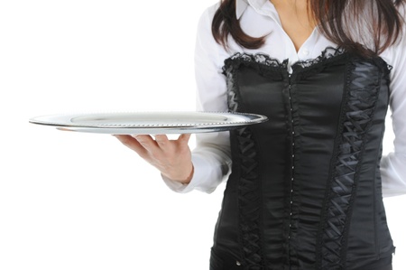Waiter holding empty silver trayの写真素材