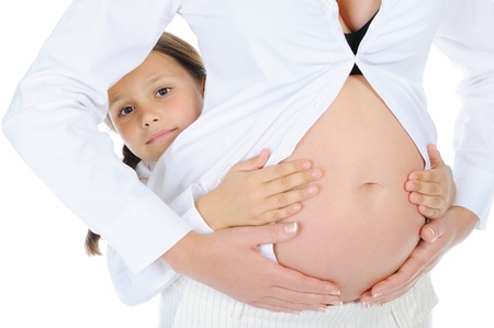 pregnant woman with her daughterの写真素材