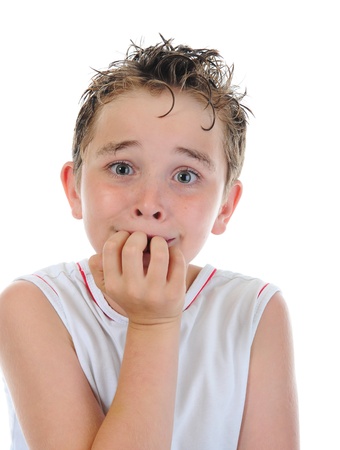Portrait of a frightened boyの写真素材