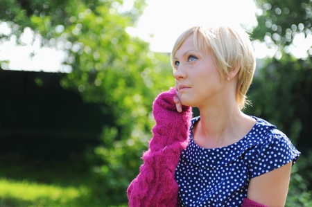 Young woman relaxing in a parkの写真素材