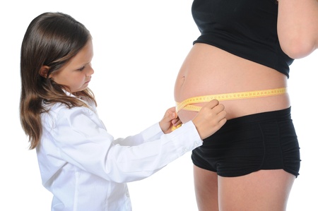 pregnant woman with her daughterの写真素材