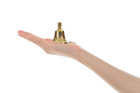hand bell in the woman's handの写真素材