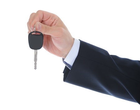 Businessman gives the keys to the carの写真素材