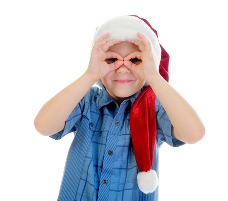 Cheerful boy in Santa Claus hatの写真素材