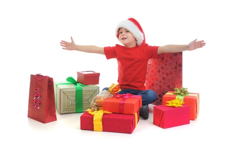 Cheerful boy in Santa Claus hatの写真素材
