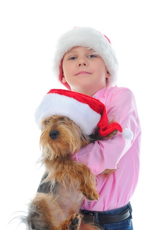 Cheerful boy in Santa Claus hatの写真素材