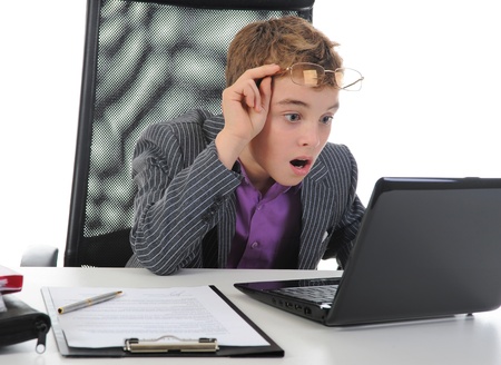 Young businessman using a laptopの写真素材