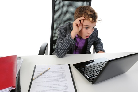 Young businessman using a laptopの写真素材