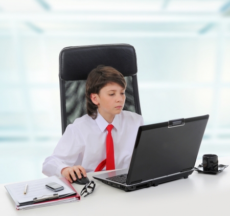 Young businessman using a laptopの写真素材