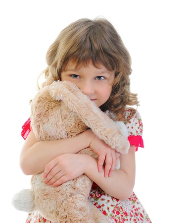 Little girl with toy hare の写真素材