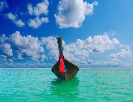 Longtail boat on the sea tropical beachの写真素材