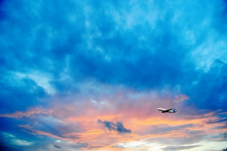Airline flying in the sky at night