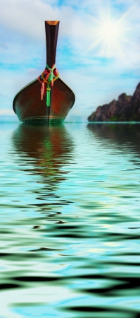 Longtail boat on the sea tropical beachの写真素材