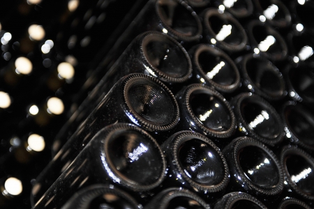 Old bottles of red wineの写真素材