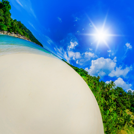 Beautiful sunny beach in the form of the planet