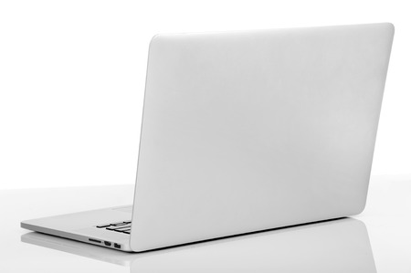 New laptop with a popular design  Isolated on white backgroundの写真素材