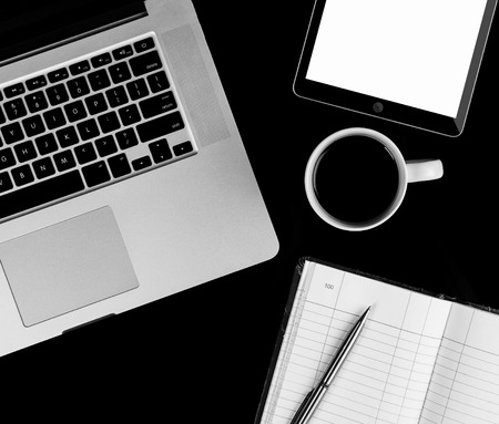 Coffee cup and laptop for business. top view