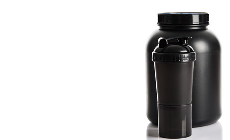 Sport Nutrition, Whey Protein and Gainer  Black Plastic Jars and Shaker isolated on white backgroundの写真素材