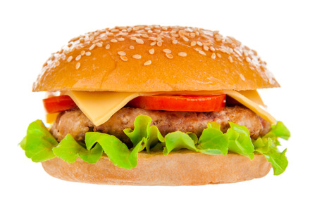 Big beautiful juicy burger with meat and vegetables. Isolated on white backgroundの写真素材