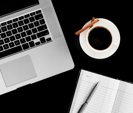 Coffee cup and laptop for business. top viewの写真素材