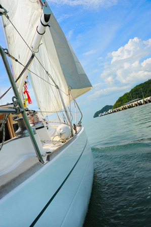 Image of a beautiful yacht in the open sea on a sunny dayの写真素材