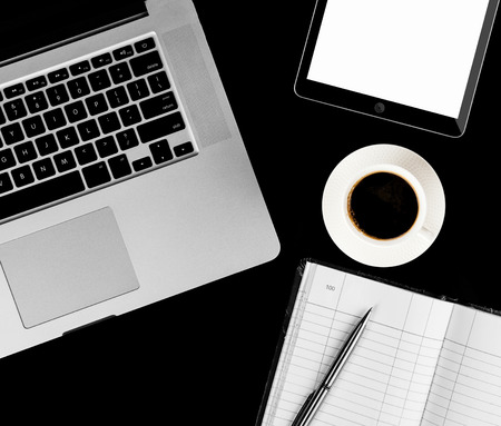 Coffee cup and laptop for business. top viewの写真素材