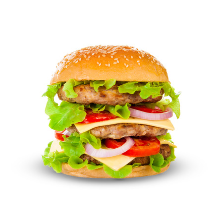 Big beautiful juicy burger with meat and vegetables. Isolated on white backgroundの写真素材