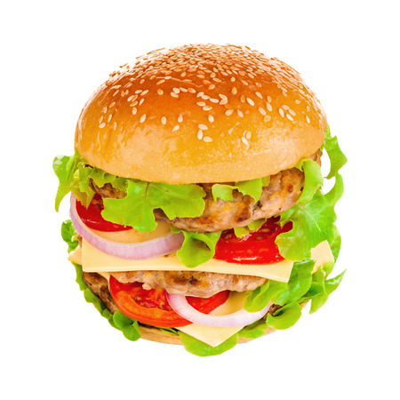 Big beautiful juicy burger with meat and vegetables. Isolated on white backgroundの写真素材