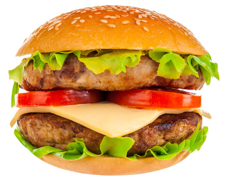 Big beautiful juicy burger with meat and vegetables. Isolated on white backgroundの写真素材