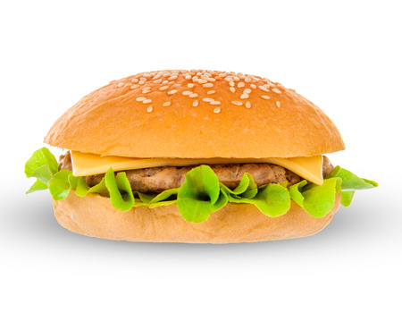 Big beautiful juicy burger with meat and vegetables. Isolated on white backgroundの写真素材