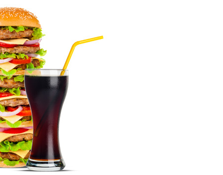 Cola and Big beautiful juicy burger with meat and vegetables. Isolated on white backgroundの写真素材