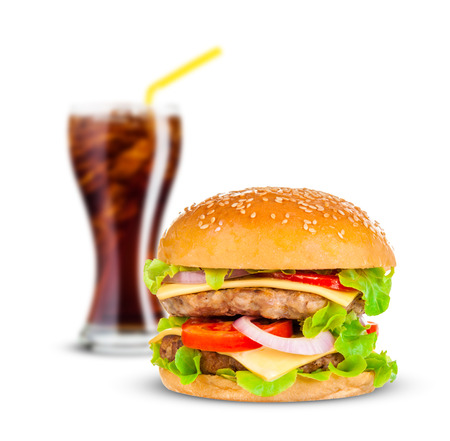 Cola and Big beautiful juicy burger with meat and vegetables. Isolated on white backgroundの写真素材