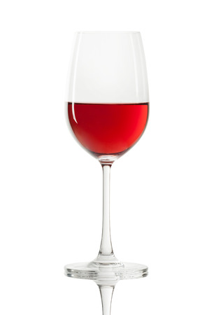 Red wine in a glass isolated over white backgroundの写真素材
