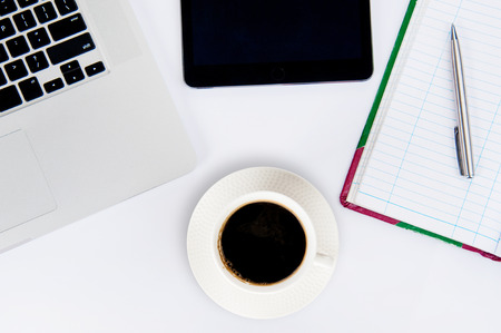 Coffee cup and laptop for business. top viewの写真素材