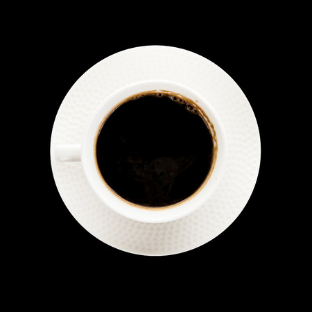 coffee with cinnamon stick isolated on black backgroundの写真素材