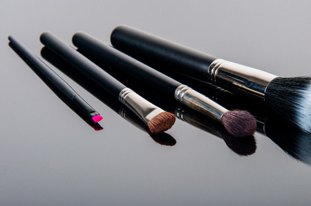 Professional make-up brush cosmetic on black backgroundの写真素材