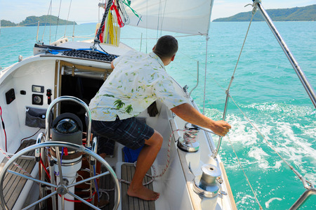 Image of a beautiful yacht in the open sea on a sunny dayの写真素材