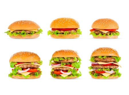 Big beautiful juicy burger with meat and vegetables. Isolated on white backgroundの写真素材